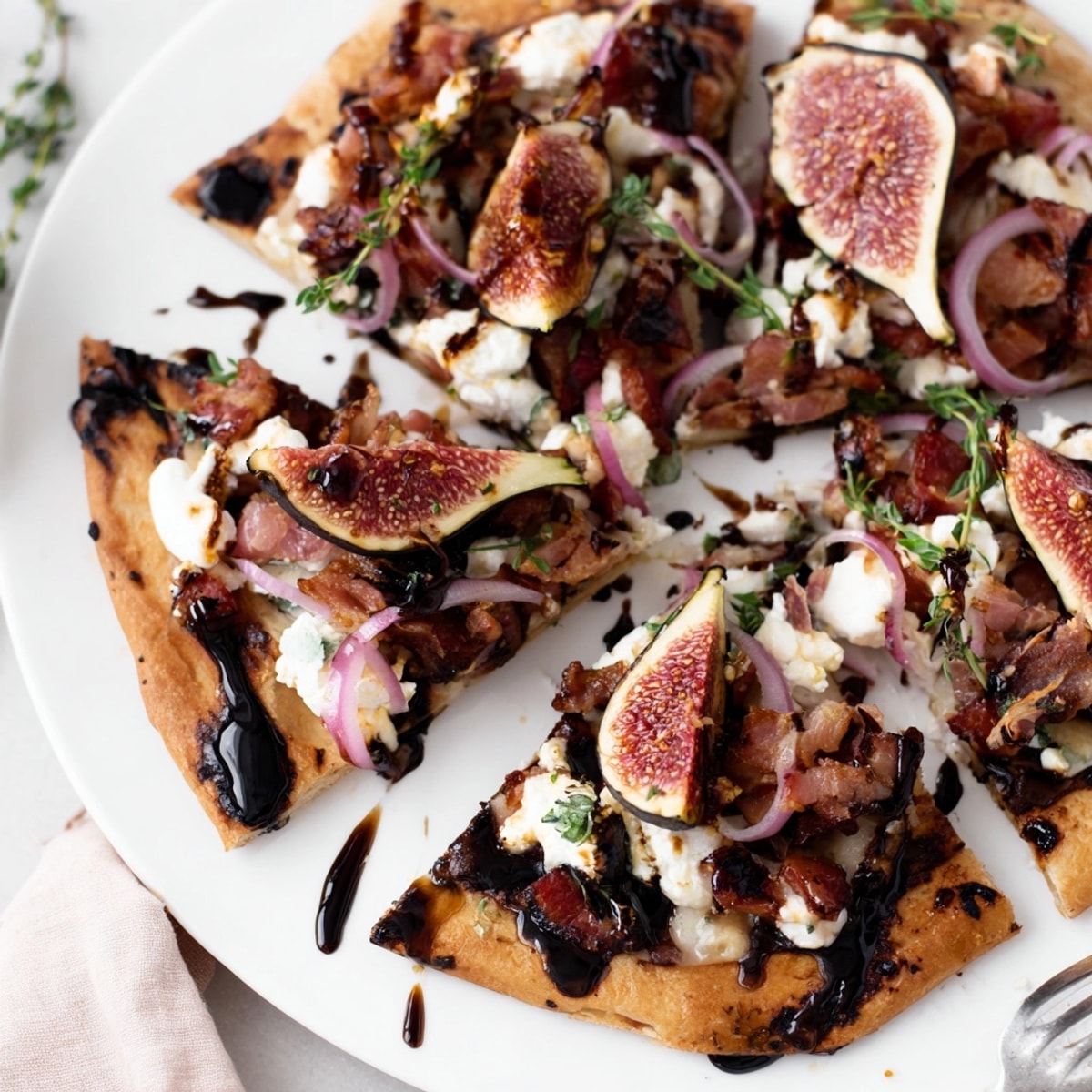 Golden brown Roasted Balsamic Fig & Bacon Flatbread, bubbling cheese, ready to slice.
