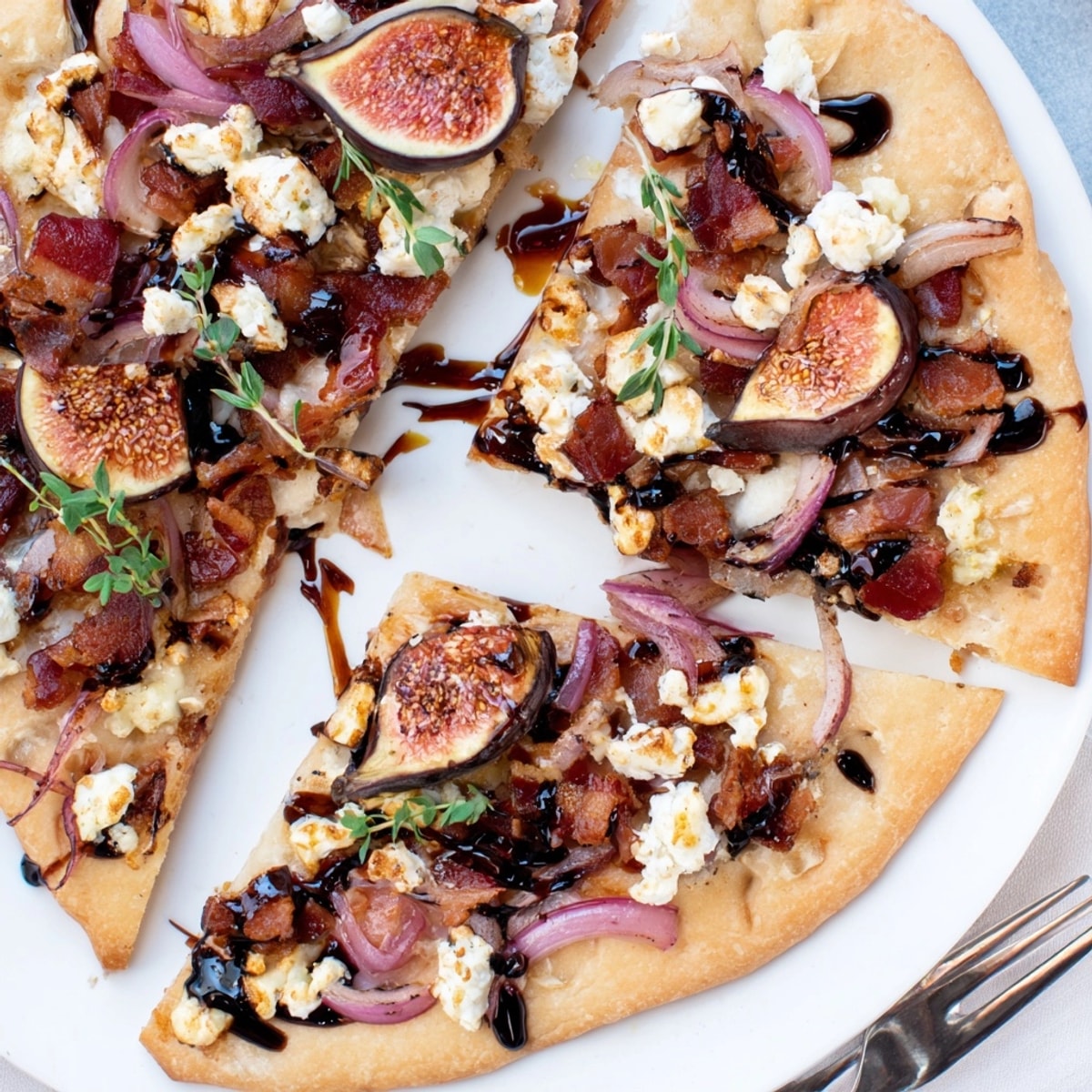 Savory Roasted Balsamic Fig & Bacon Flatbread with sweet figs and crispy bacon.