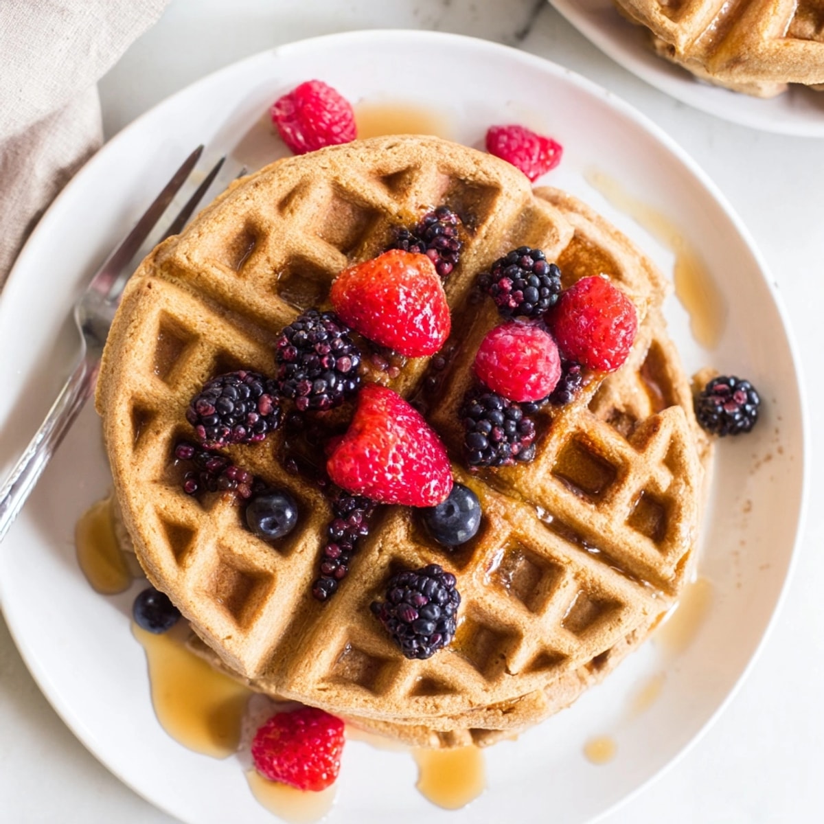 Close-up view: Protein Waffles cooked until crispy, awaiting toppings for breakfast.