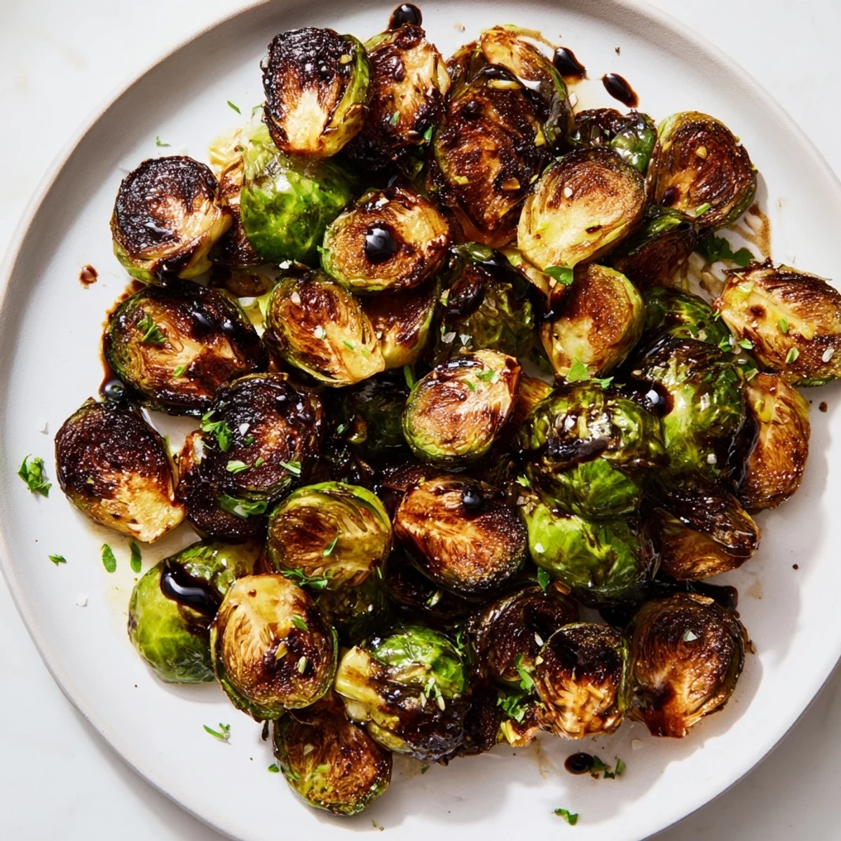 Healthy and delicious, these Roasted Brussels Sprouts feature a rich balsamic reduction, smelling divine.