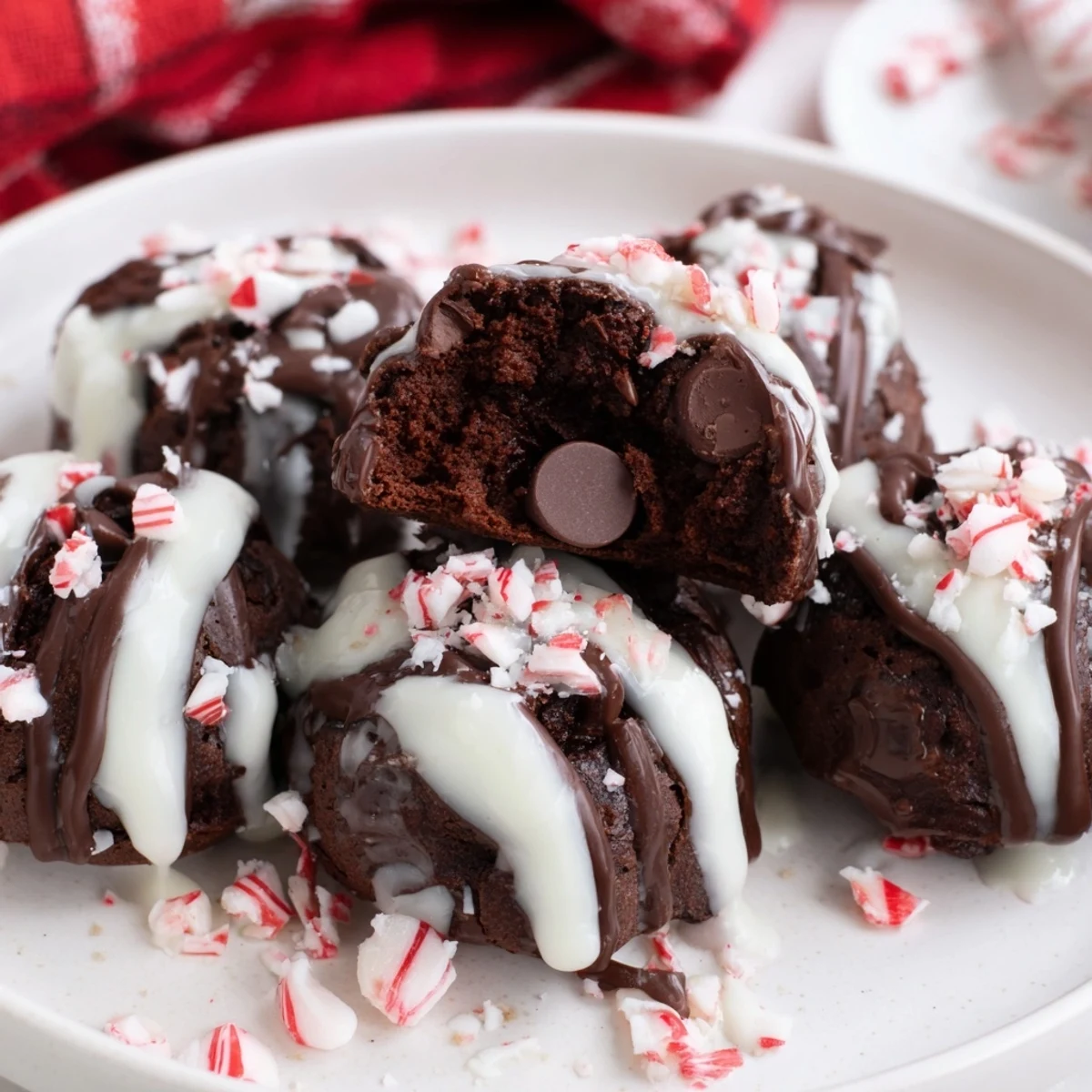 Close-up of freshly baked peppermint brownie bites, rich with chocolate, a perfect dessert.