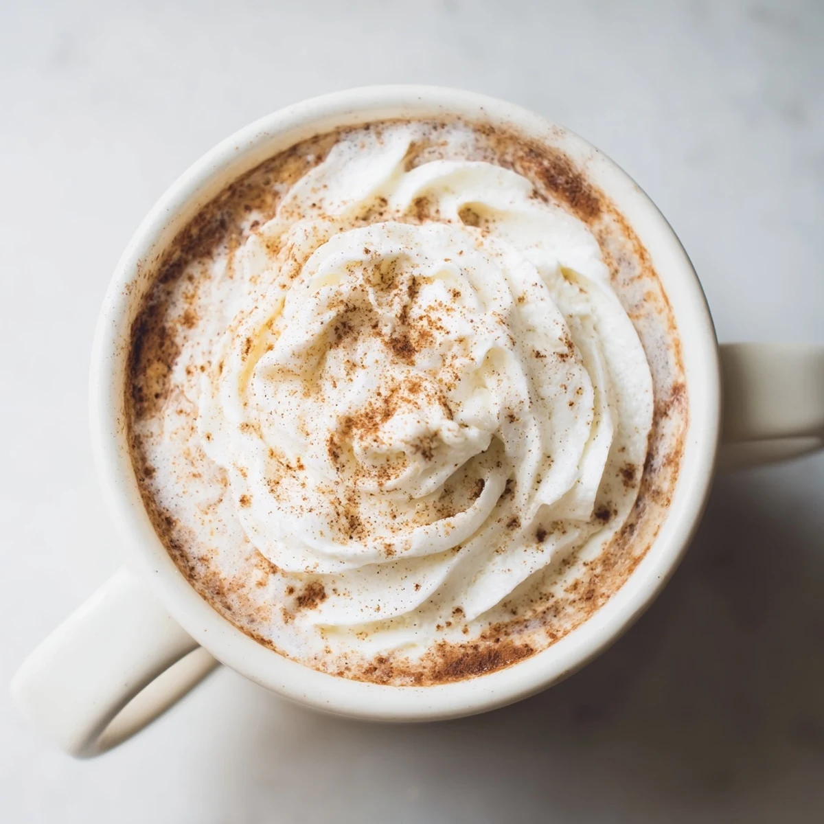 Enjoy a homemade Gingerbread Spiced Latte, a deliciously spiced coffee beverage, and flavorful.