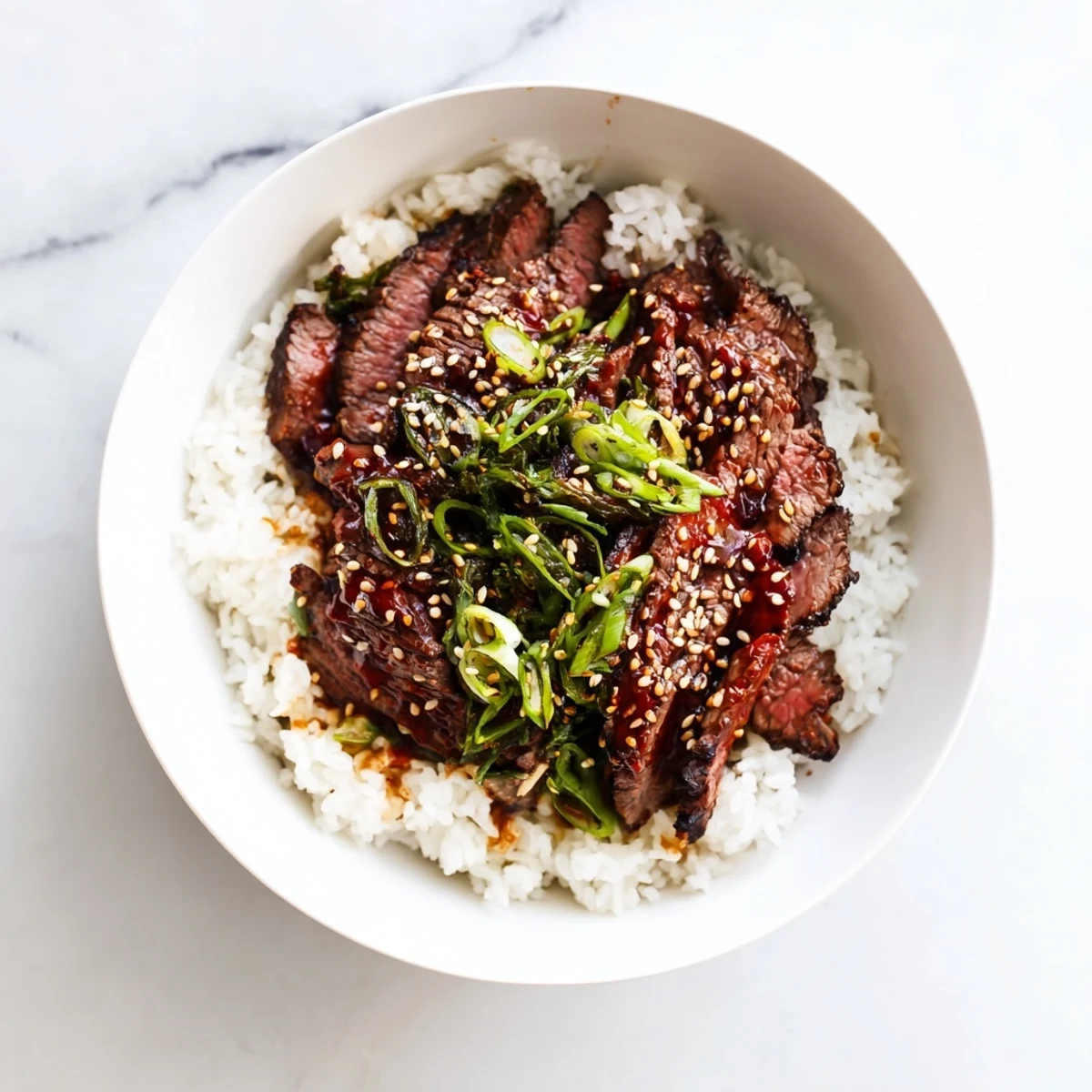 A vibrant serving of spicy Korean beef bowl with kimchi on the side, perfect for an easy weeknight dinner.
