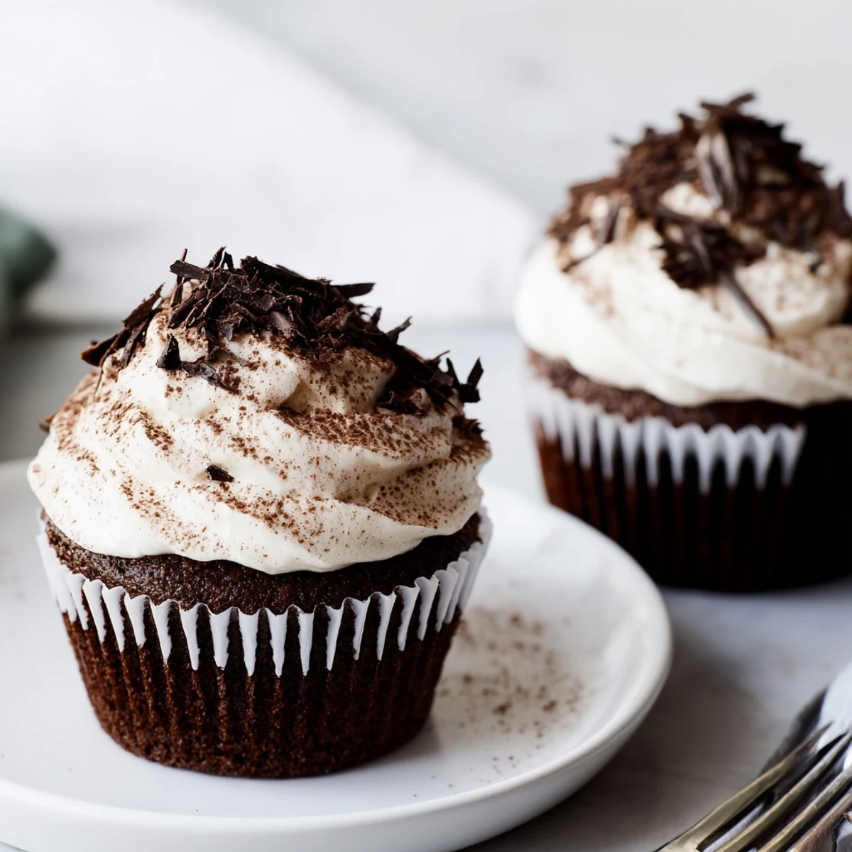 Irresistibly decadent chocolate tiramisu cupcakes with coffee-infused sponge and light mascarpone cream topping