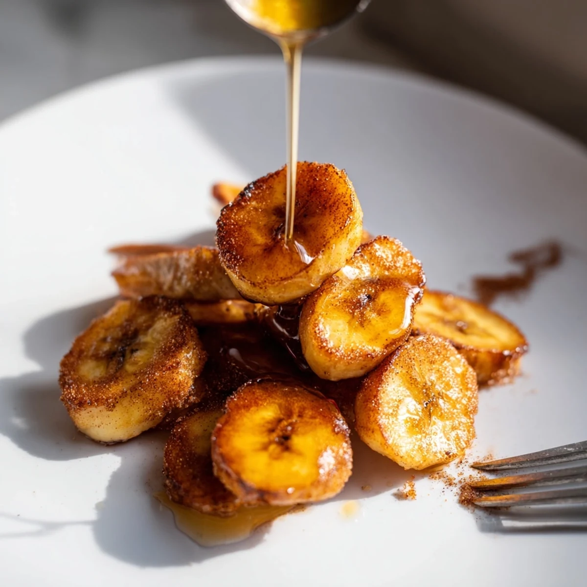 Sweet cinnamon fried bananas served warm as a breakfast or dessert topping