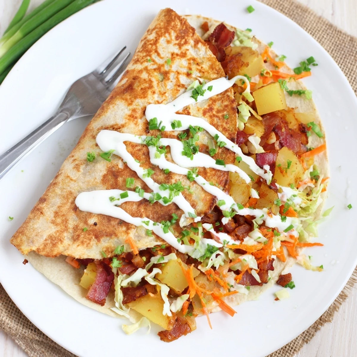 Homemade Irish tacos featuring tender corned beef, golden fried potatoes, and crunchy vegetable topping