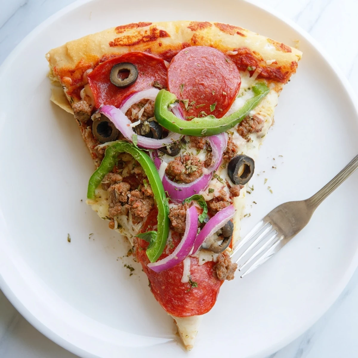 Focaccia Pizza Supreme with bubbling mozzarella, golden crust, pepperoni and basil.