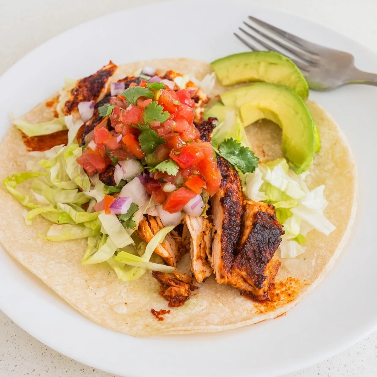 Charcoal Grilled Tacos Recipe served hot with avocado slices and cilantro